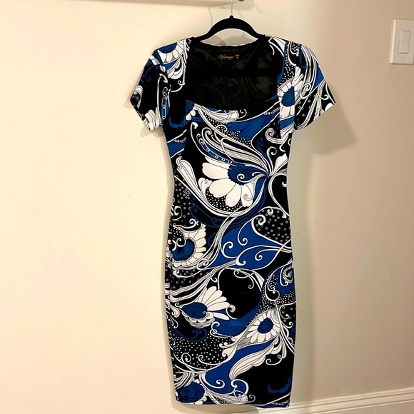 A classy yet sophisticated knee long dress - Picture 3 of 6